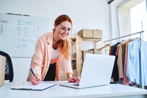 An entrepreneur takes an order for merchandise.