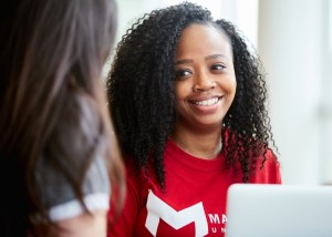 black student with advisor