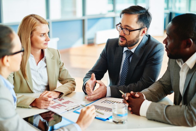 A diverse group of businesspeople in a meeting