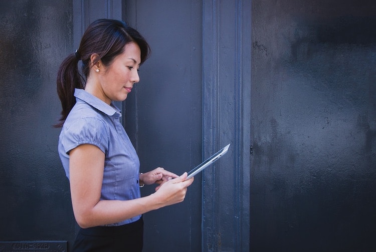 female accounting student using tablet