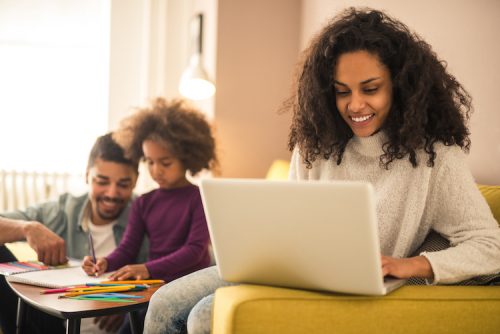 Women working with her computer at home.